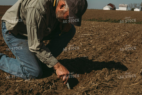 Farmer Checking Planting Depth 4005