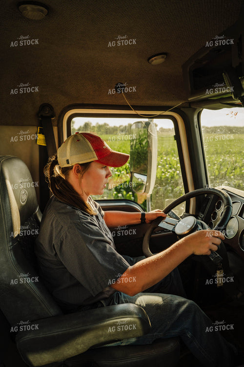 Female Farmer Driving Semi 115248