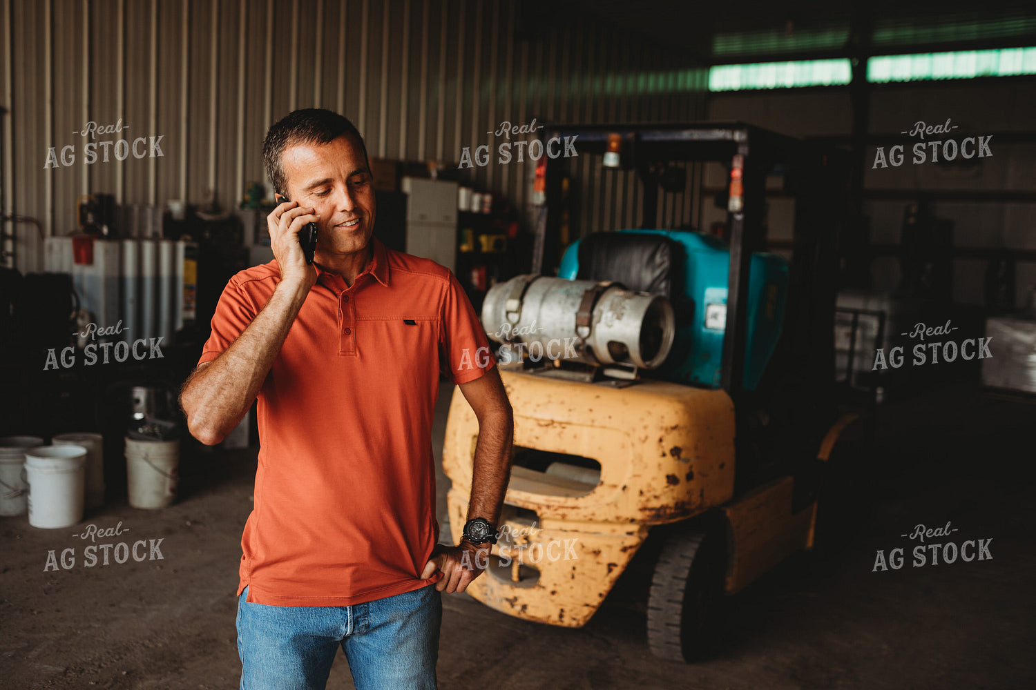 Farmer on Phone in Shop 4523