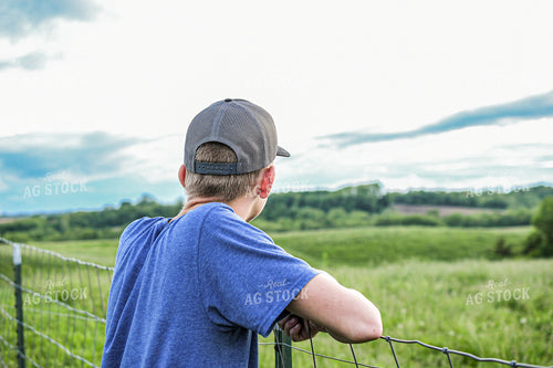 Farm Kid Leaning on Fence 191156