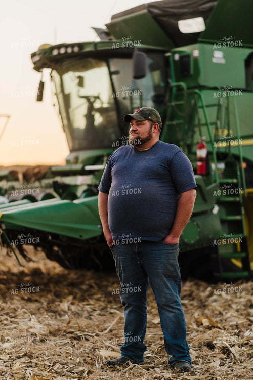 Farmer Standing in Corn Field 115049