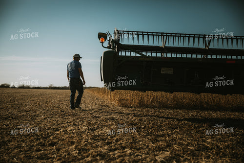 Farmer Walking Through Field 7121