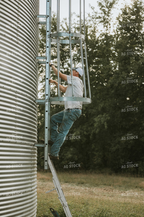 Farmer Climbing Grain Bin Ladder 4802
