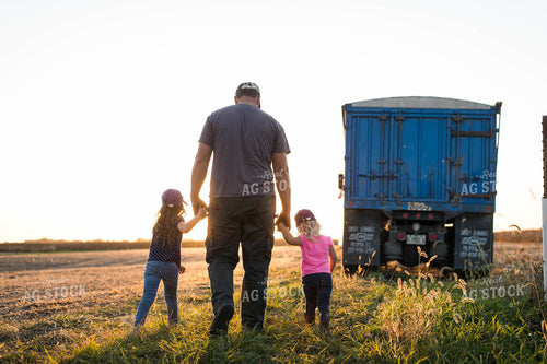 Farmer and Farm Kids in Field 115031