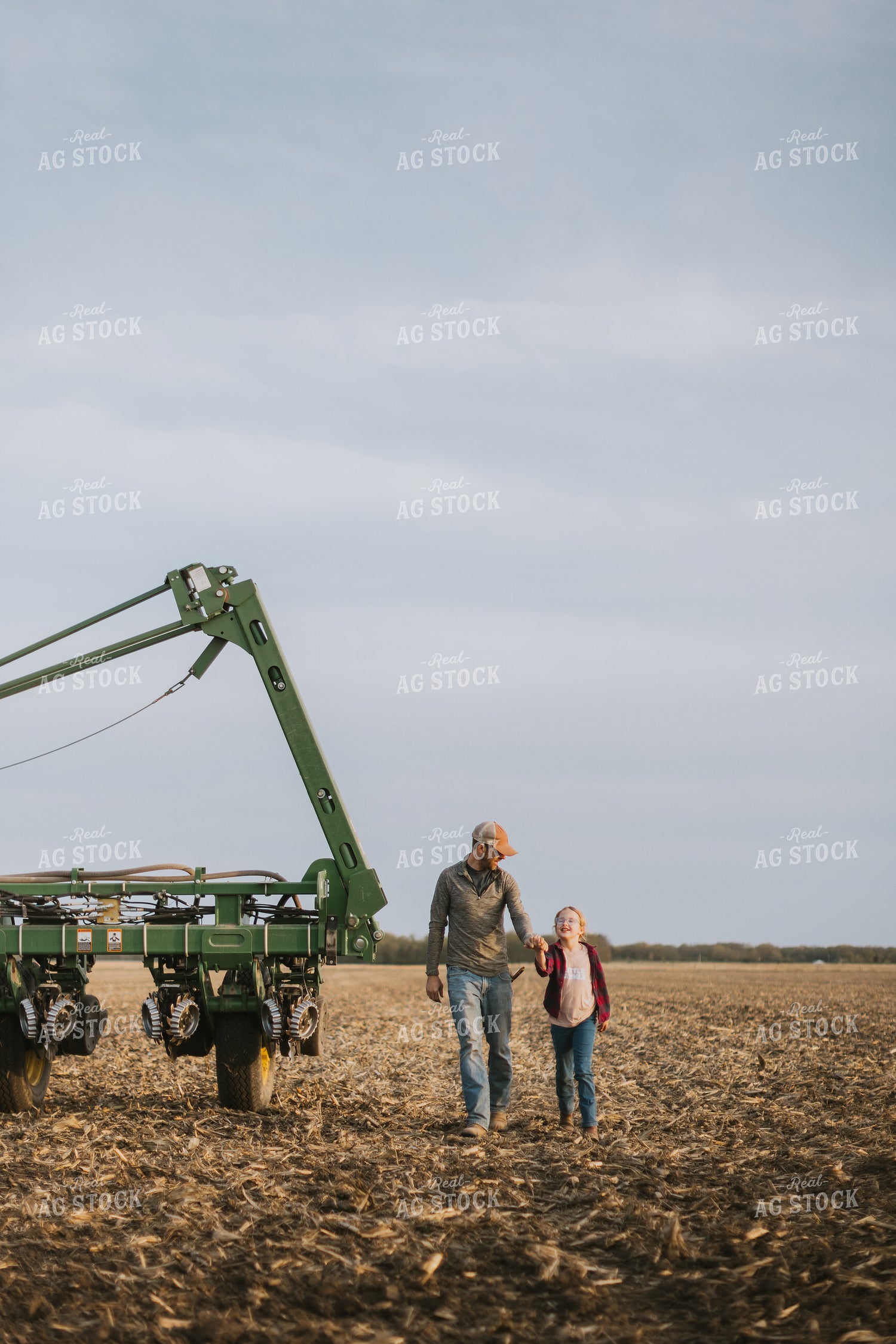 Farmer Walking in Field by Planter with Daughter 8225