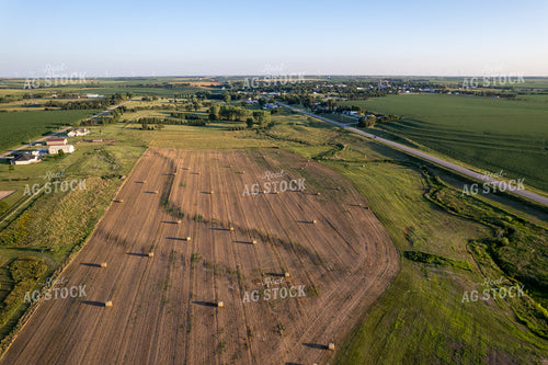 Aerial of Hay Bales Near Town 65730