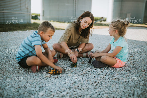 Farm Mom and Kids Playing with Toy Tractors 6168