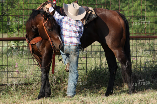 Ranch Kid Climbing on Horse 205015