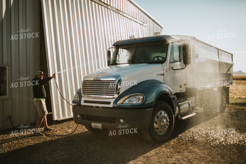 Farmer Hosing off Tandem Farm Truck 4668