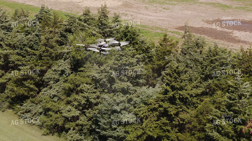 Drone Sprayer Spraying Bag Worms in Evergreens  239289
