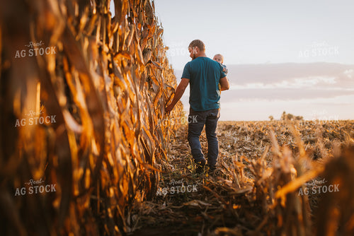 Farmer Checking Corn with Kid 9387