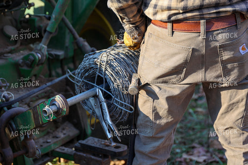 Putting Up Barbed Wire Fence 52274