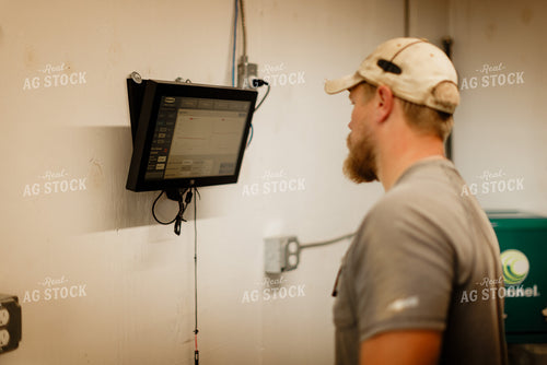 Farmer Checking Moisture of Stored Corn 9342