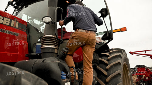 Farmer Climbing into Planter 25151