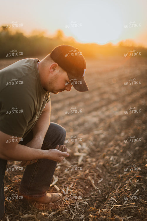 Farmer Checks Soil 7719