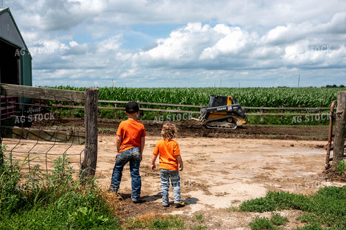 Farm Kids Watching Skid Steer 115818
