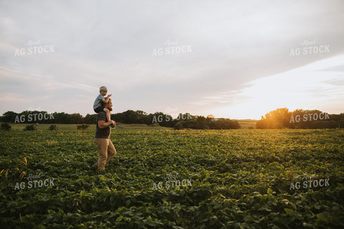 Farmer and Farm Kid in Field 6019