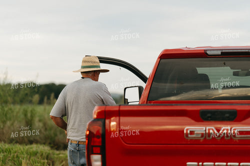 Farmer Getting in Truck 125264