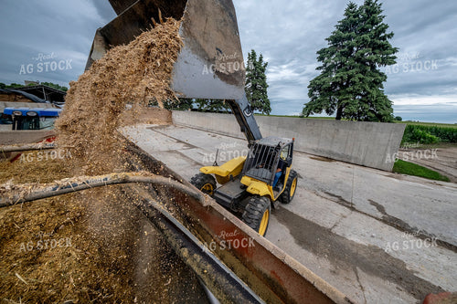 Farmers Loading Feed Mixer 250195