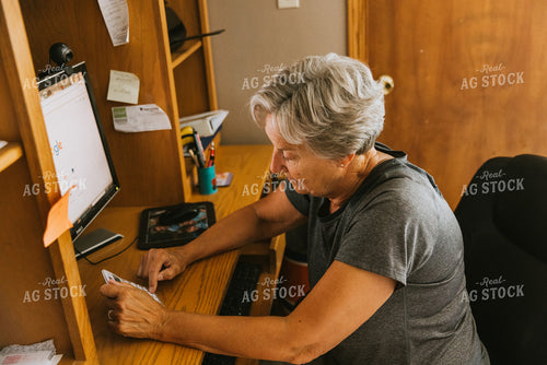 Female Farmer on Computer 8119