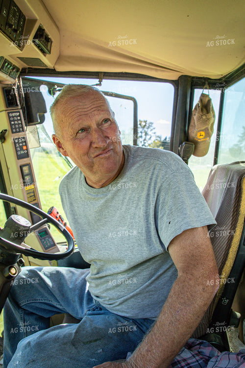 Farmer in Tractor Cab 142014
