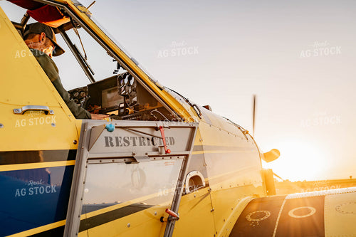 Pilot in Crop Duster 218014