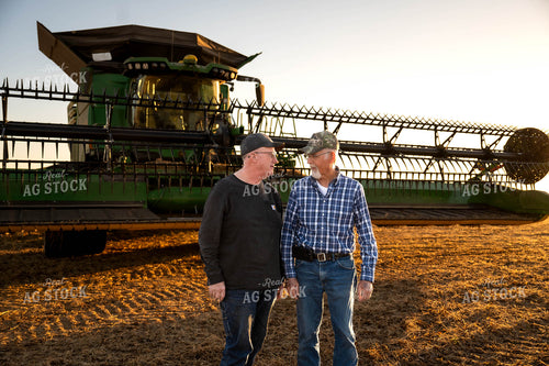 Farmers Walking by Combine 115591