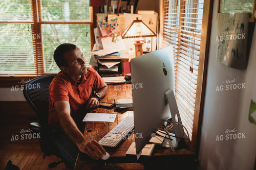 Farmer in Farm Office on Computer 4441
