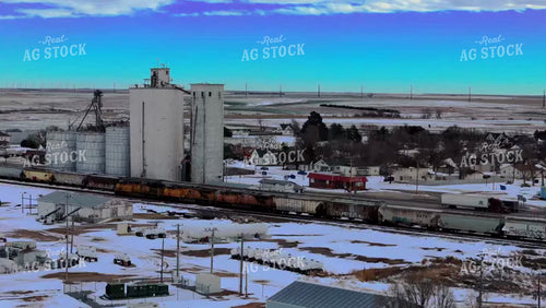 Grain Terminal Alongside Train Tracks 239153