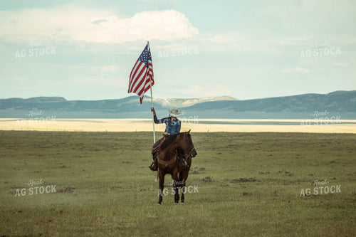 Holding American Flag while Horseback 58015