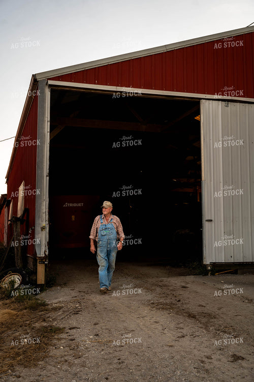 Farmer Walking by Shed 115900