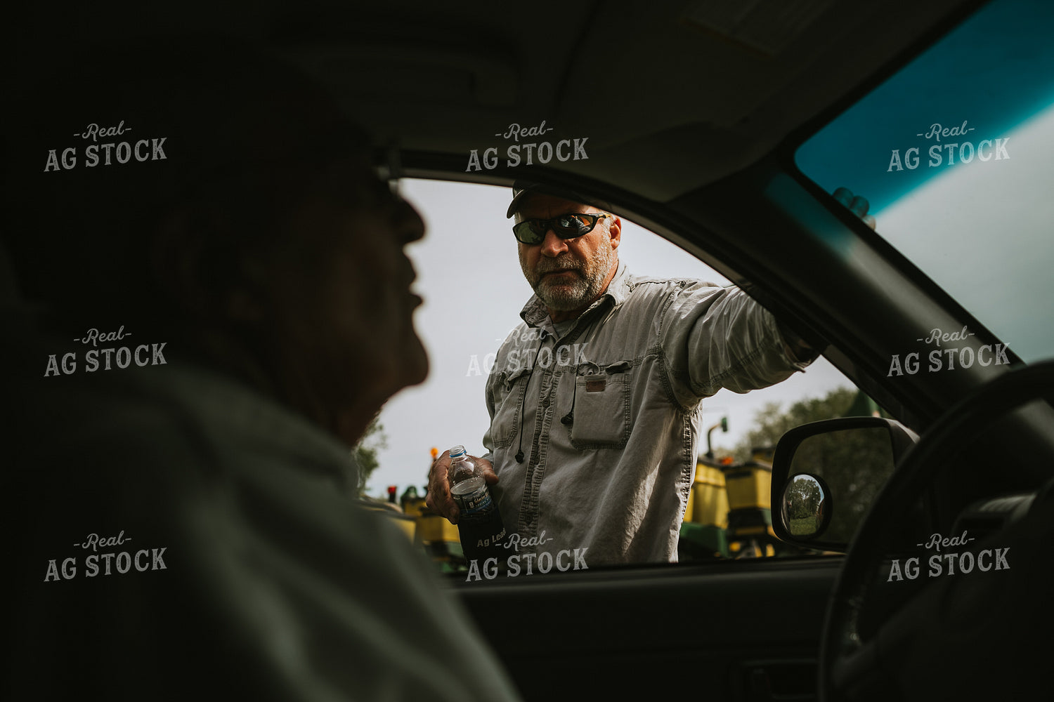 Multiple Farmer Generations Talking 4028