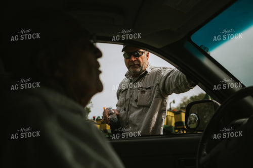 Multiple Farmer Generations Talking 4028