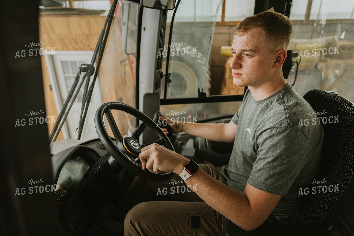 Young Farmer Drives Tractor 7549