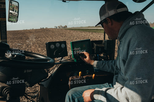 Farmer in Planter with Monitors 4095