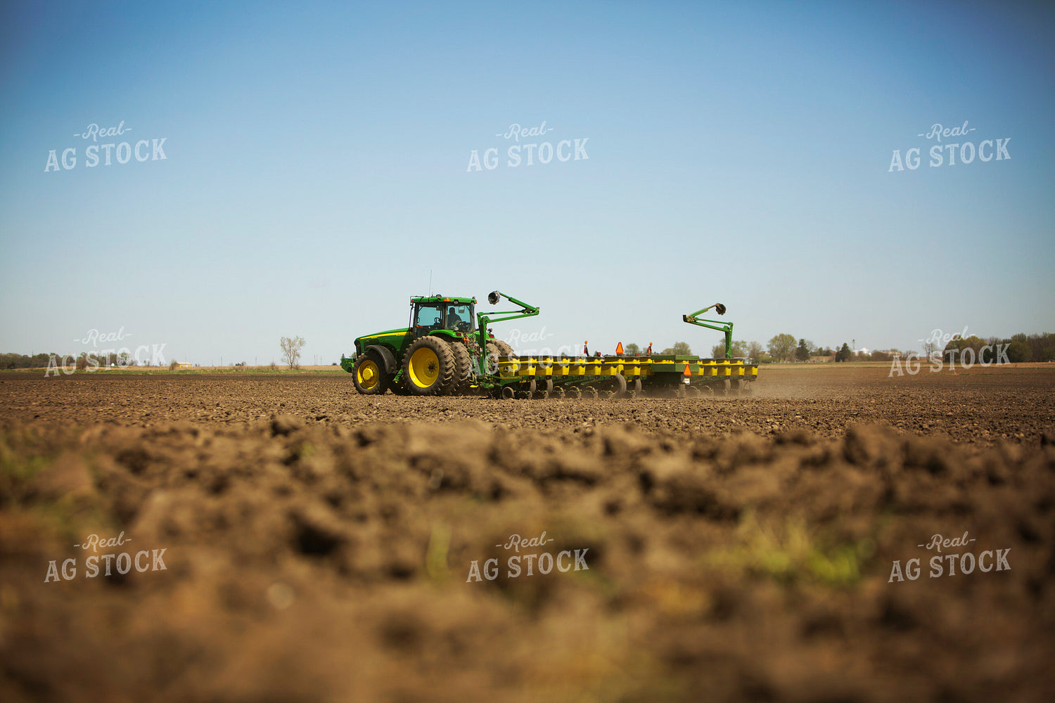 Tractor Pulling Planter in Field 6361