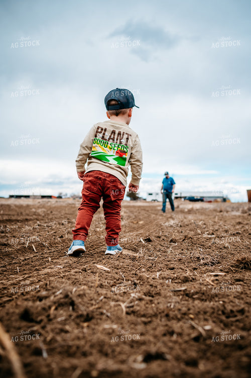 Farm Kid Standing in Field 56572