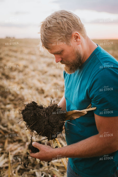 Farmer Checking Root Ball 9403