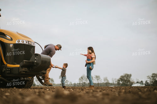 Farm Mom Taking Kids Out to Tractor During Planting 5641