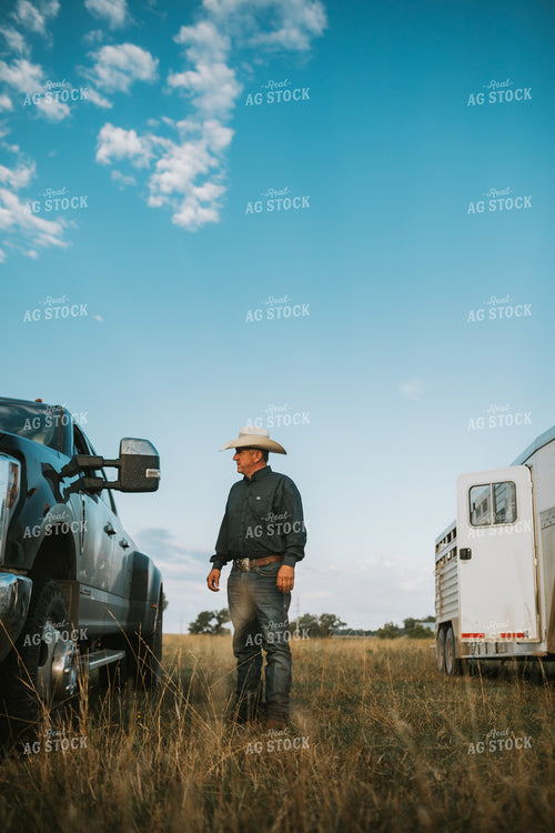 Rancher Standing by Pickup Truck 6491