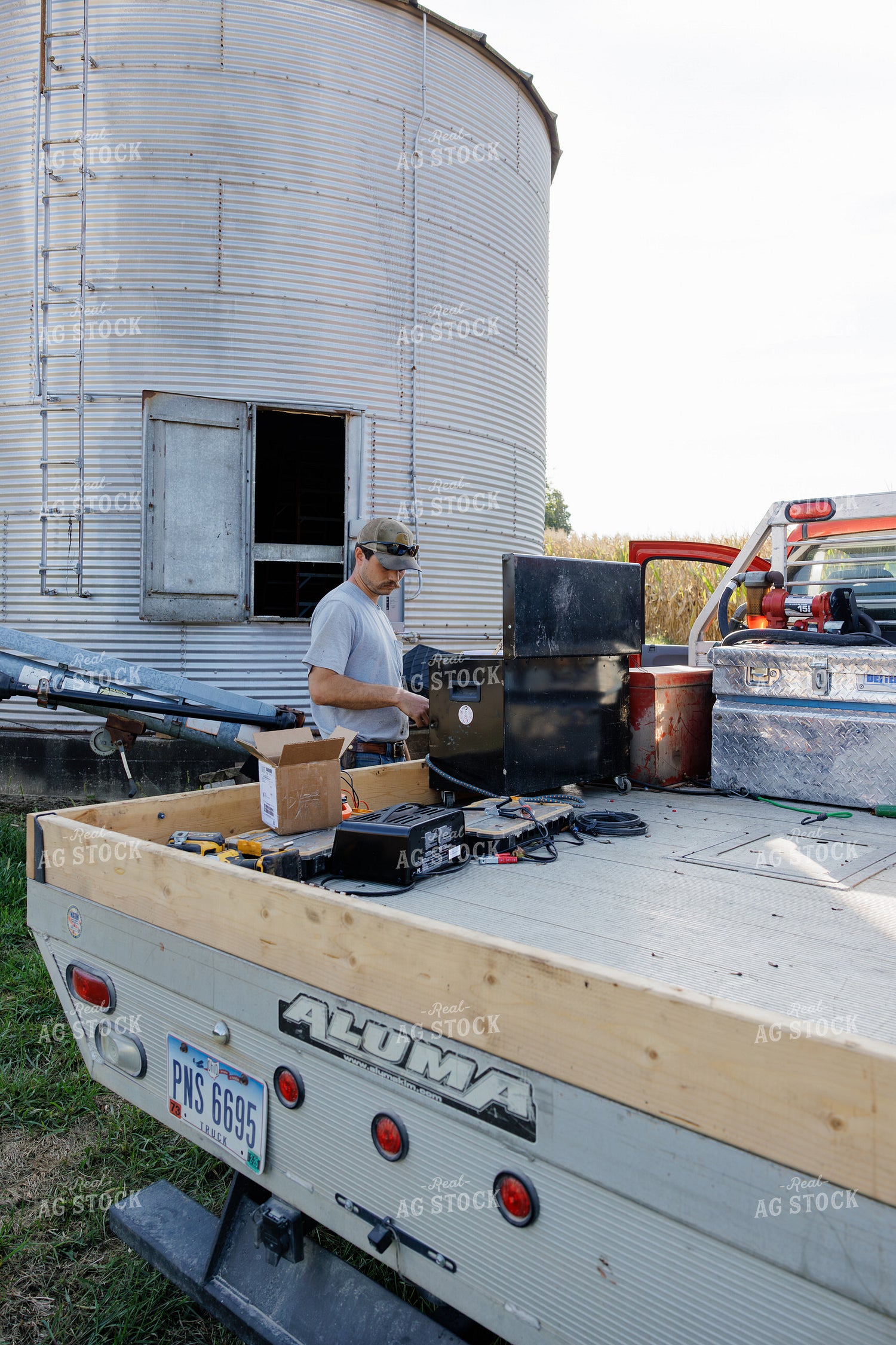 Farmer Making Repairs 295030
