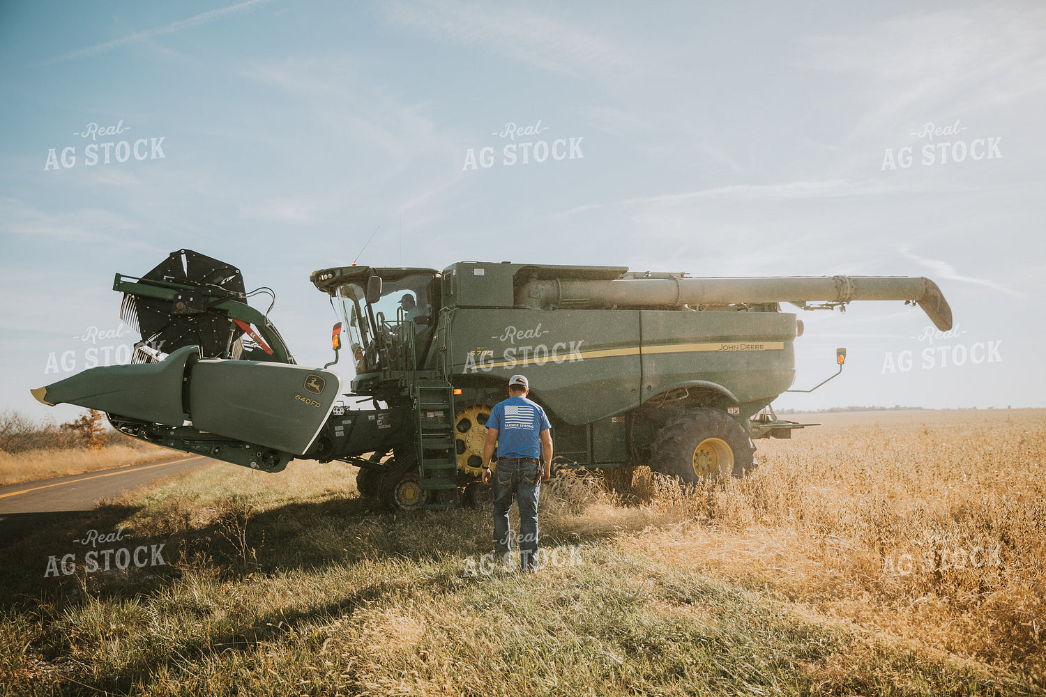 Farmer Walking Towards Combine 7088