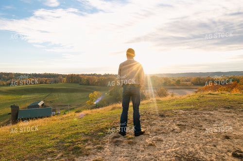Farmer Overlooking Farm on Hill 52651