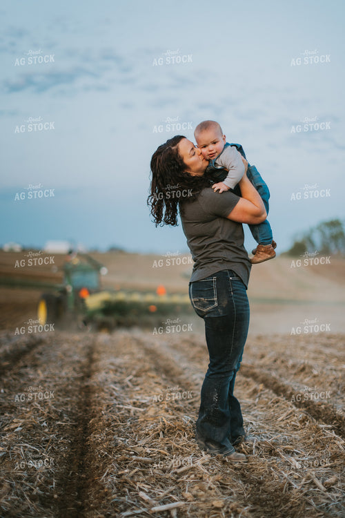 Farmer Playing with Farm Kid in Field 7470