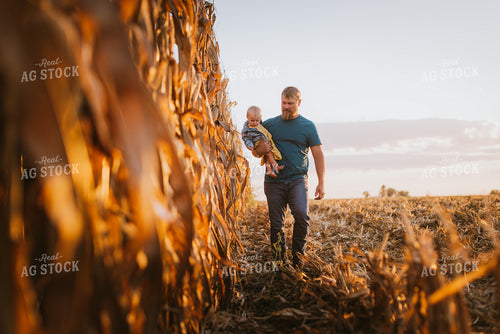 Farmer Checking Corn with Kid 9386