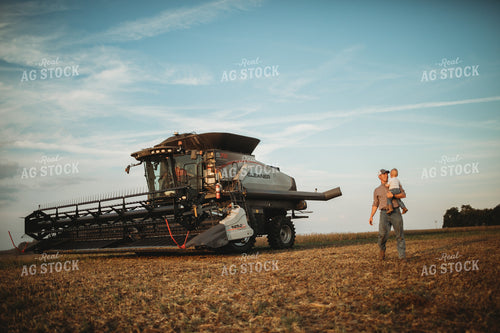 Farmer with Farm Kid and Combine 4869