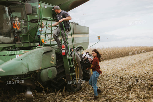 Farm Family Loading Kids into Combine 8560