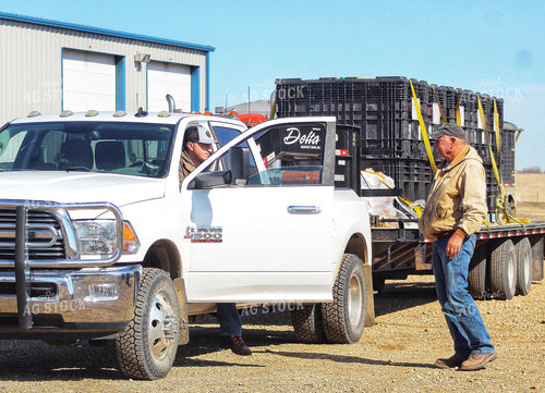 Seed Salesman Unloading Pro Boxes 141226