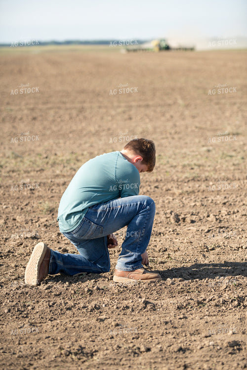 Farm Kid Checking Seed Depth 86038