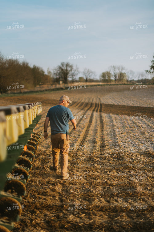 Farmer Walking Away From Planter 7450